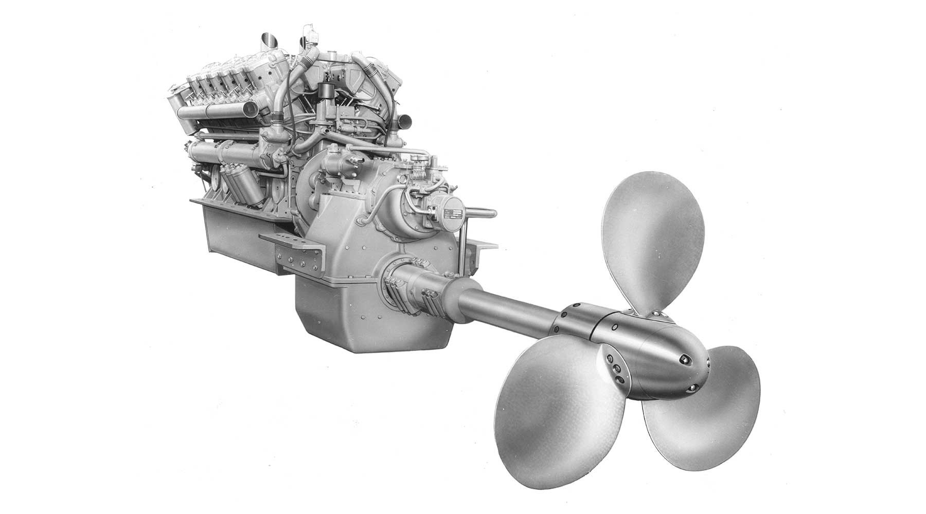 Old Moteurs Baudouin engine attached to propeller and gearbox.