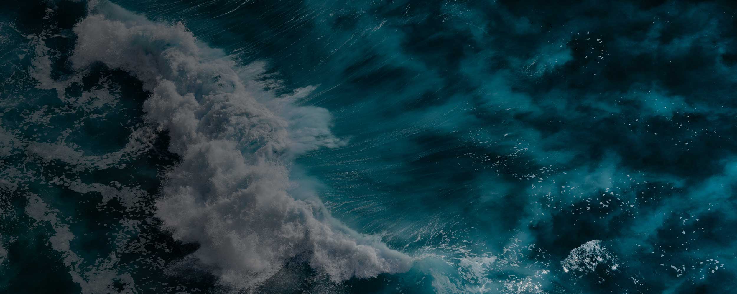 Blue crashing wave.